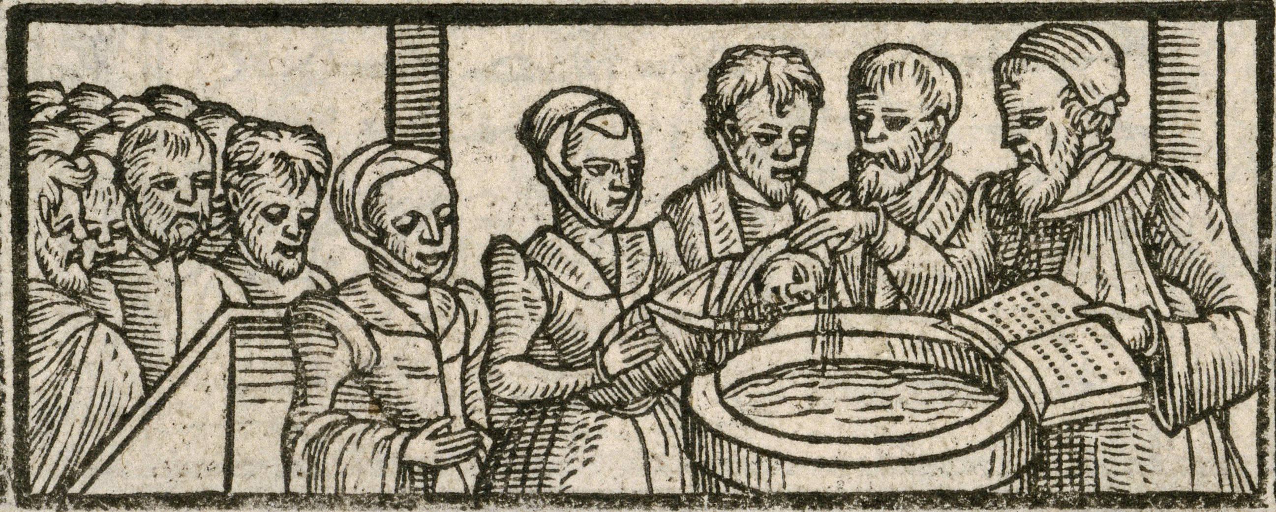 Black and white image depicting several people, including presumably the godmother and the priest, gathered around a basin where a child is being baptised. Other members of the congregation can be seen in the left side of the image.